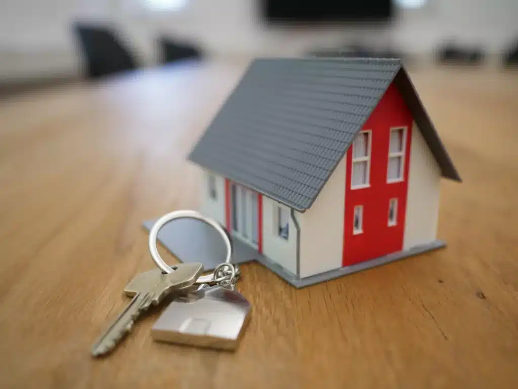 A property manager handing over keys to a tenant